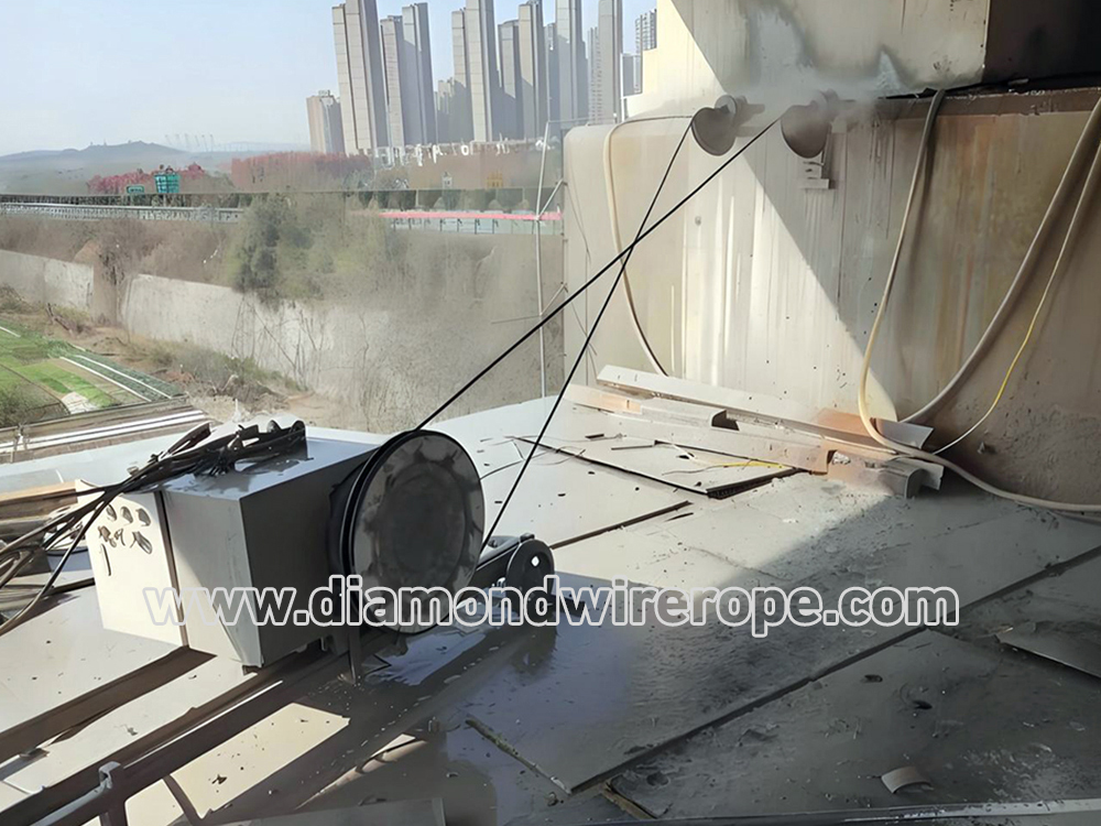 Reinforced concrete cutting:  Diamond rope concrete saw for cutting